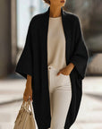Queliralyne - Oversized strikket cardigan i sandbeige