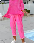 Seraphira - Casual jumpsuit med monogramprint og hulmønstret bluse