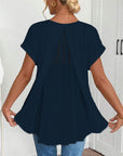 Estella - Ensfarvet T-shirt med korte ærmer og patchwork