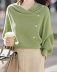 Isavellora - Elegant draperet sweater med guldknapper