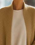 Queliralyne - Oversized strikket cardigan i sandbeige
