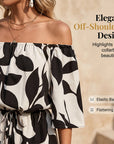 Ivoriah - Kort jumpsuit til damer med bare skuldre og bladprint