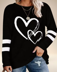 Faloria - Oversized sweatshirt til damer med hjerteprint