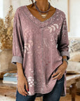 Selmira - Retrobluse med elegant bladprint