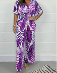 Lucia - Feminin tropisk jumpsuit med korte ærmer og V-hals