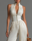 Nexavira - Elegant plisseret jumpsuit med brede ben til aftenbrug