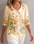 Mavessia - Damebluse i bomuld og hør med kunstnerisk vintage-blomsterprint