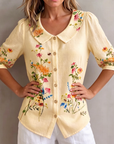 Mavessia - Damebluse i bomuld og hør med kunstnerisk vintage-blomsterprint