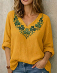 Jynelle - Elegant bluse med V-hals og broderi