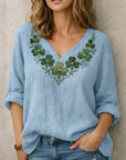 Jynelle - Elegant bluse med V-hals og broderi