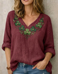 Jynelle - Elegant bluse med V-hals og broderi