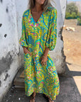 Herminie - Elegant maxikjole med smukt sommerprint til damer
