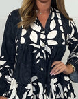 Alix - Elegant bluse med udsvingende ærmer og V-hals
