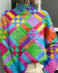 Noelle - Regnbuefarvet rullekravesweater til damer
