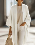 Queliralyne - Oversized strikket cardigan i sandbeige
