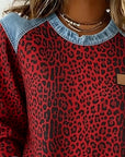 Averelisse - Afslappet sweater med leopardprint og denim-patchwork