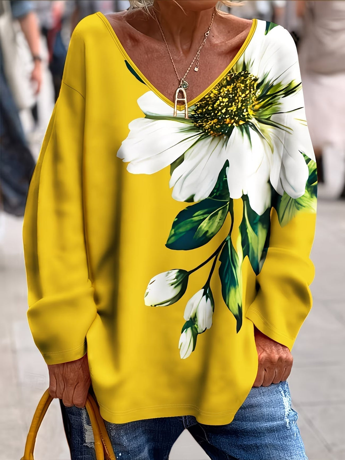 Olivira - Løs top med blomstermønster inspireret af naturen