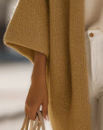 Queliralyne - Oversized strikket cardigan i sandbeige