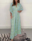 Queniva - Elegant jumpsuit i stretch med V-hals og høj talje
