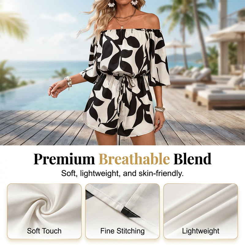 Ivoriah - Kort jumpsuit til damer med bare skuldre og bladprint