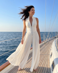 Zakira | Plisseret halterneck-jumpsuit med vide ben