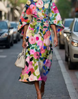 Havirelle - Elegant blomstret midikjole til damer med flydende ærmer og kunstnerisk print