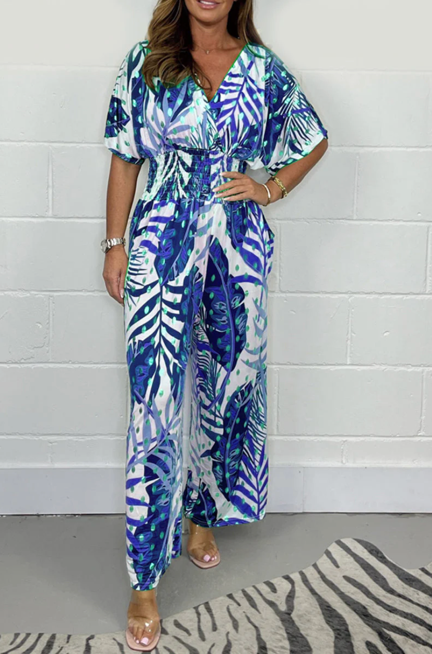 Lucia - Feminin tropisk jumpsuit med korte ærmer og V-hals
