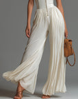 Nexavira - Elegant plisseret jumpsuit med brede ben til aftenbrug