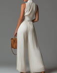 Nexavira - Elegant plisseret jumpsuit med brede ben til aftenbrug