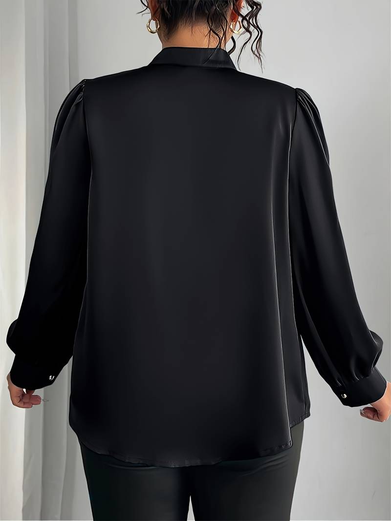 Thaliravelle - Elegant bluse med pufærmer og V-hals