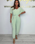 Cymara - Jumpsuit i bomuld med V-hals og bindedetalje