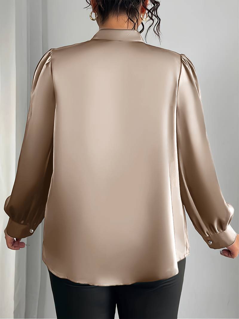 Thaliravelle - Elegant bluse med pufærmer og V-hals