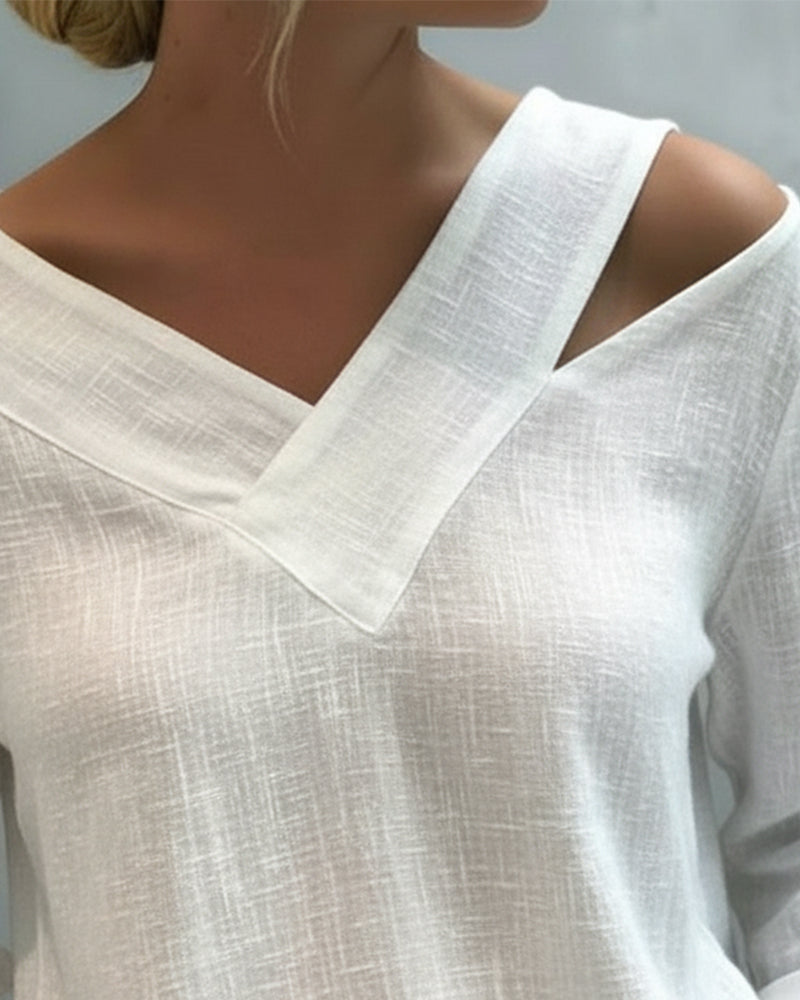 Melyra - Elegant top med asymmetrisk V-hals