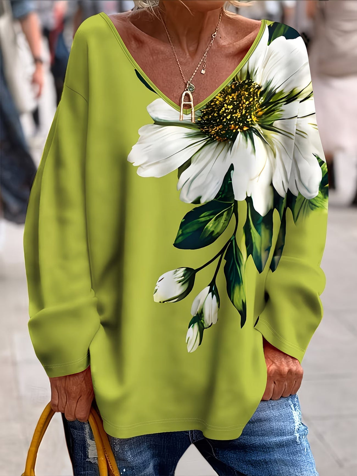 Olivira - Løs top med blomstermønster inspireret af naturen
