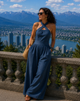 Fiorenzae - Feminin jumpsuit i flydende stof med krydset overdel og elegante vide ben