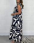 Adelinae Jumpsuit med elegant geometrisk print