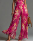 Zakira | Plisseret halterneck-jumpsuit med vide ben