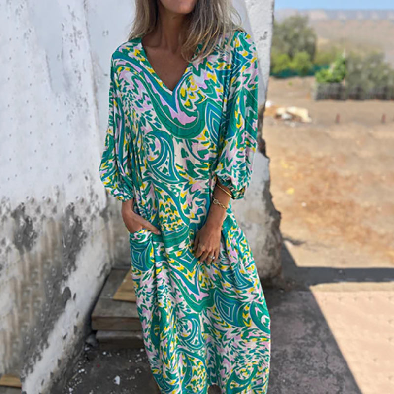 Herminie - Elegant maxikjole med smukt sommerprint til damer