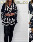 Alix - Elegant bluse med udsvingende ærmer og V-hals